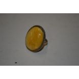 A butterscotch amber set ring size N