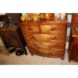 A 19th Century mahogany bow front chest of two sho