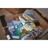 A box of football programmes