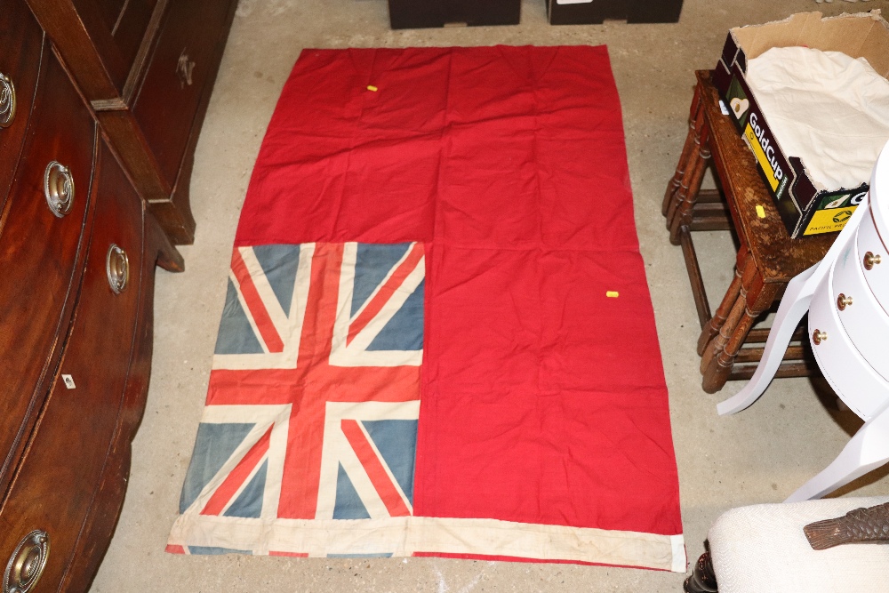 Two Naval Ensign flags