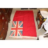 Two Naval Ensign flags