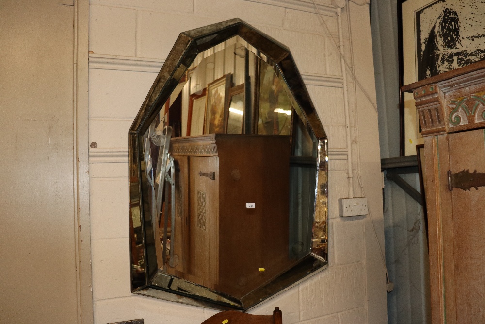 A large Venetian type bevel edged wall mirror