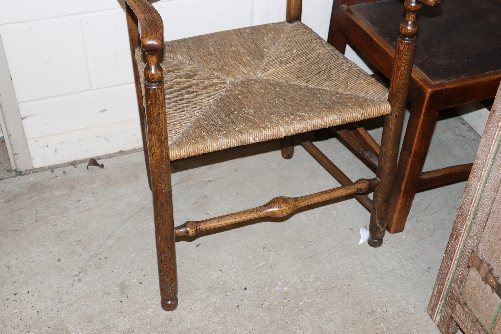 An antique elm ladder back elbow chair with rush s - Image 4 of 4