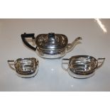 A silver three piece tea set Birmingham 1936, teap