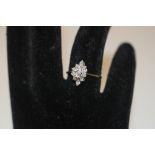 A 9ct gold and diamond set cluster ring, ring size