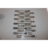 A set of twelve silver table forks, London 1863, a