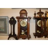 A Victorian walnut and inlaid regulator type wall