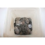 A tub of various copper coinage