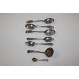 A silver sifter spoon; three silver spoons engrave