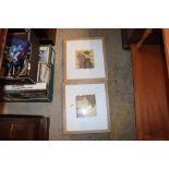 A pair of indistinctly pencil signed prints of cat