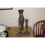 A pair of Victorian copper candlesticks and a copp
