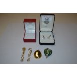 Two pairs of ear rings, a green glass heart shaped