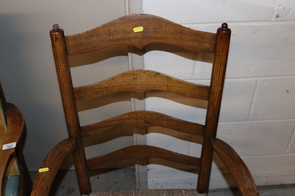 An antique elm ladder back elbow chair with rush s - Image 3 of 4