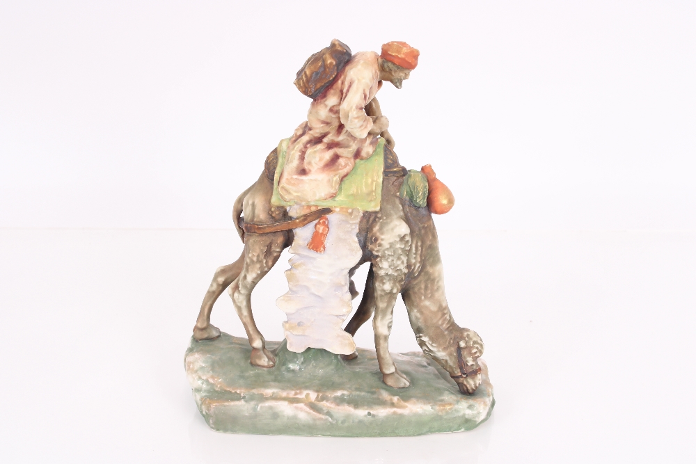 An Amphora porcelain group depicting desert rider