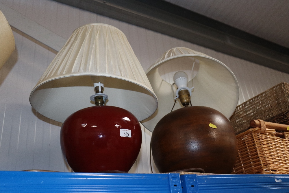 A wooden table lamp and shade together with anothe