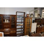 A stained pine open bookcase