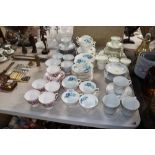 A collection of various patterned tea ware to incl