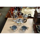 A quantity of half fluted silver plated teaware and a silver plated coffee pot