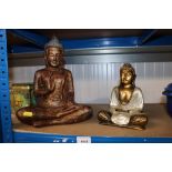 Two ornaments in the form of Buddhas