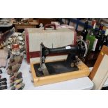 A Singer hand sewing machine