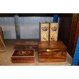 Three wooden trinket boxes and two boxes in the fo