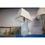 A table lamp and shade