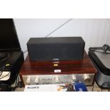 A Luxman stereo amplifier; and a Merak speaker