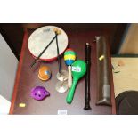 A collection of musical instruments to include rec