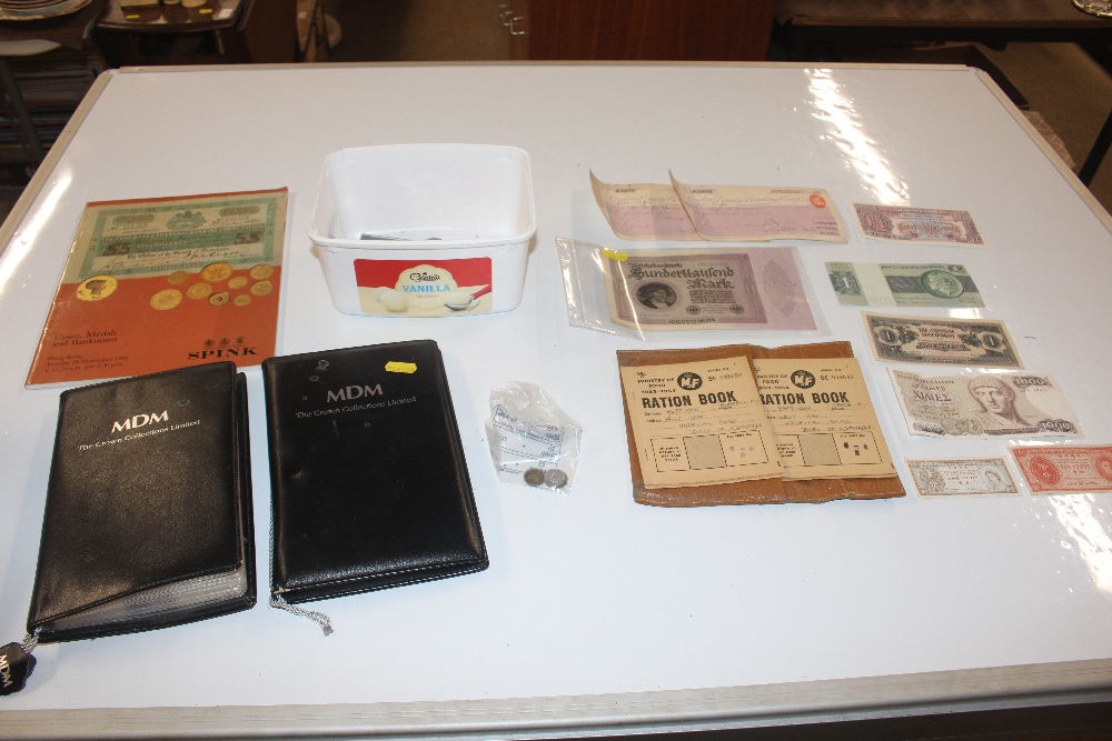 A box of variolous coinage, bank notes and books