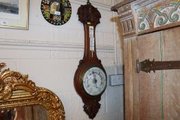 An Edwardian carved walnut banjo barometer AF