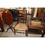 An antique elm spindle back chair with rush seat