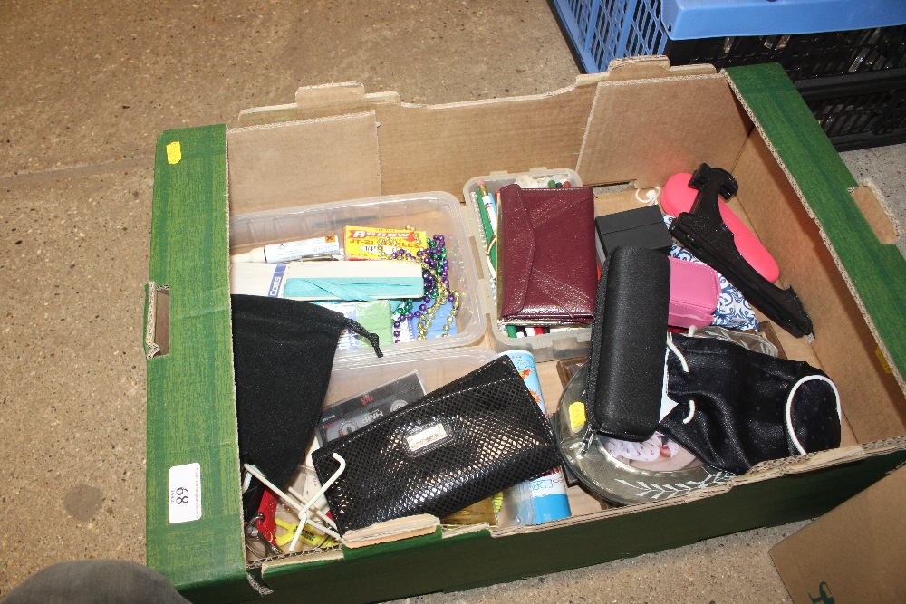 A box containing various purses, pictures etc.