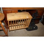 A hanging pine plate rack