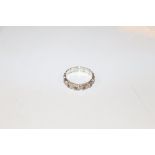 A 9ct white gold and silver eternity ring, size P,