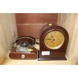 An Ilford camera and a Bakelite cased mantel clock