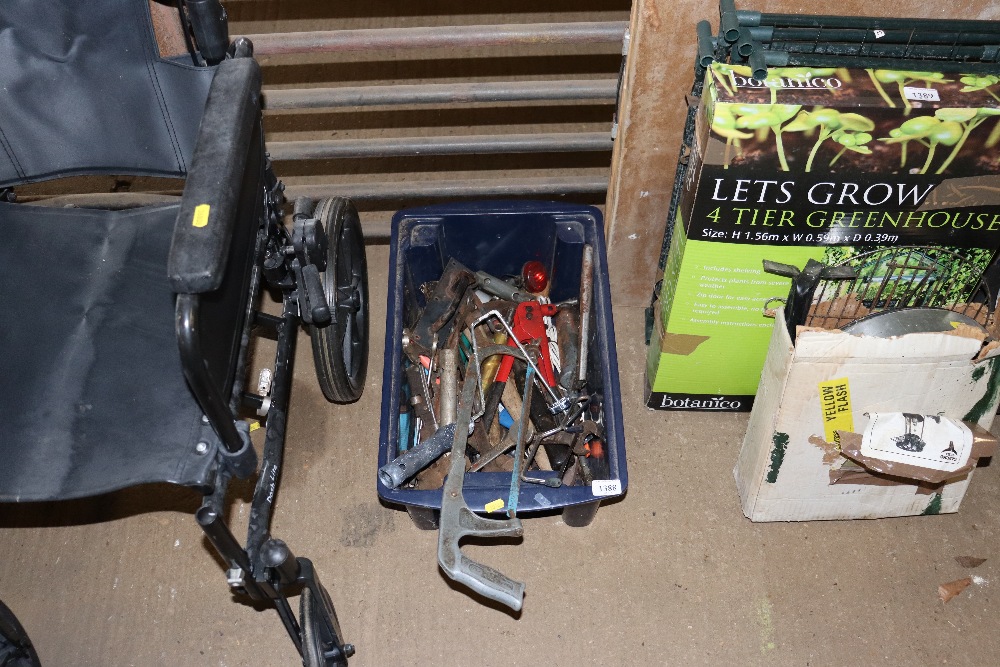 A box of various hand tools