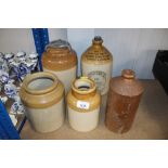 Four stoneware jars and a stoneware bottle "Mackin