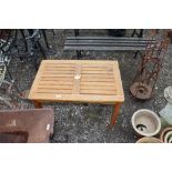 A small teak garden table