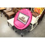 A button back upholstered swivel tub chair