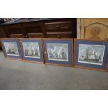 A set of four oak framed prints of ships
