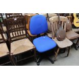 A blue upholstered swivel office chair