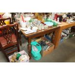 An oak drawer leaf dining table and a set of six c