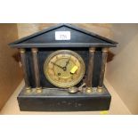 A black slate mantel clock