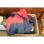 A box of various jackets and clothes
