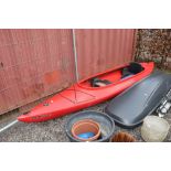 A double seater kayak and oars