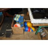 Two boxes containing swimming floats, distress whi