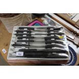 A 16 piece stainless steel knife set