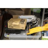 A box containing CB radios and various related ite