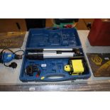 A laser level in fitted case