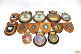 Fifteen Naval interest plaques on wooden shields